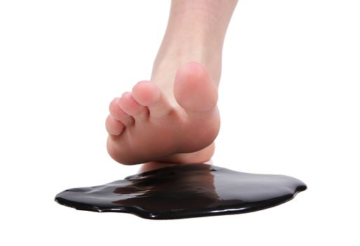 Foot crushing stain of tar in white background
