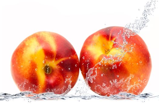 peach falling in water