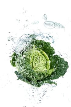 savoy cabbage falling in water