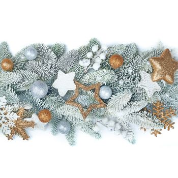 Frosted fir tree twigs and Christmas decorative bauble balls isolated on white background with copy space for text template flat lay top view design