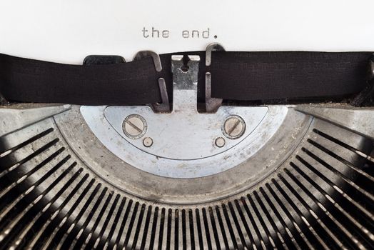 The end word typed on a vintage typewriter