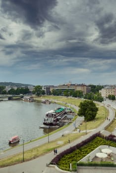 Scenic summer panorama of the city river in Cracow, Poland