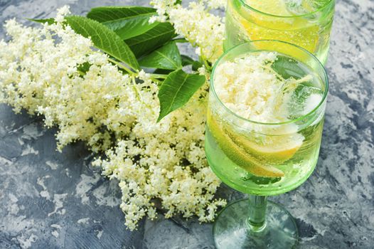 Summer drink from elderberry and lemon inflorescences.Cooling drink.Floral champagne.