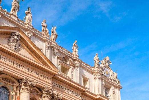 St Peter's Basilica on blue sky background. Vatican,