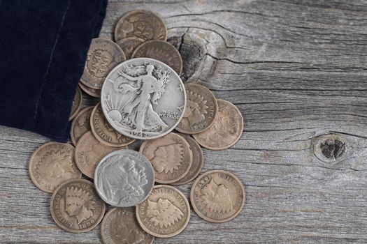 Bag of United States Rare Coins on Wood 
