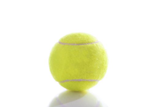 Tennis ball isolated on pure white background with reflection 