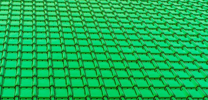 modern deep green glossy rooftop tiling texture background