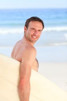Man with his surfboard