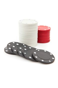 Poker tokens piled up together