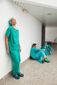 Three surgeons taking break
