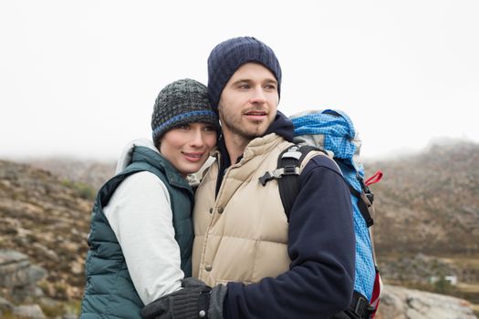 Fit loving couple on a hike in the countryside