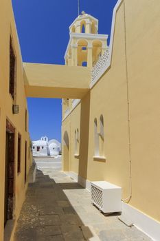 Street next to a church in Oia,Santorini, Greece