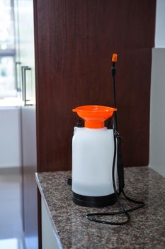 Insecticide sprayer on kitchen worktop