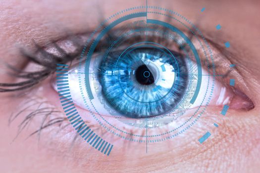 Eye scanning a futuristic interface 