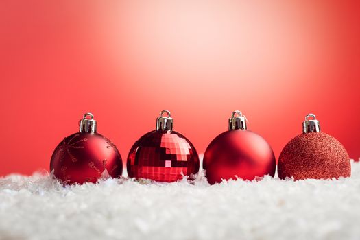 Composite image of Christmas baubles lined up 