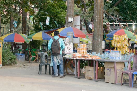 Street food stall in Millennium Eco Tourism Park and Recreational Beautification area. Photography on a quiet and relaxed evening. Famous place in city of joy for beautifully landscaped garden walking along garden, sit on benches and simply relax. Kolkata India January 2020