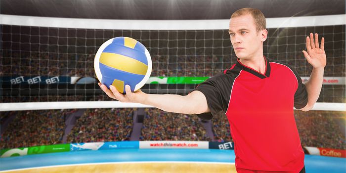 Composite image of sportsman getting ready to serve while playing volley ball