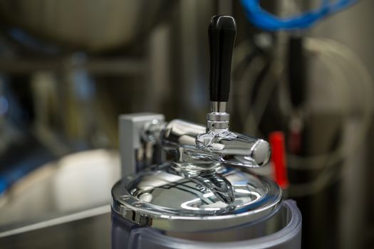 Close-up of alcohol distillery tap