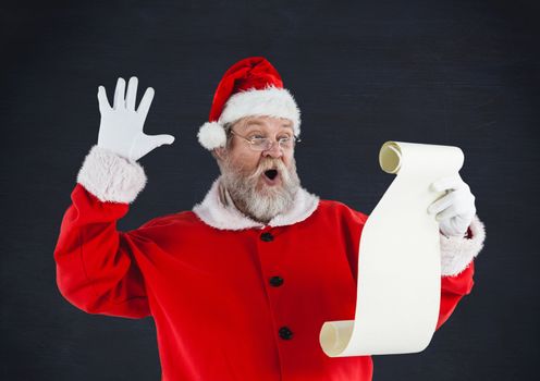 Santa claus reading a wish list