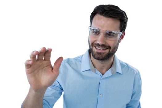 Man using protective eyewear pretending to touch an invisible object