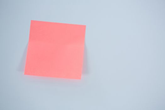 Close-up of pink adhesive note
