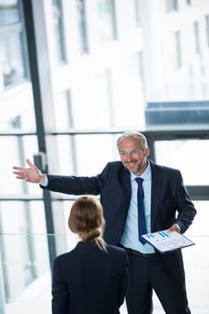 Businessman talking with colleague