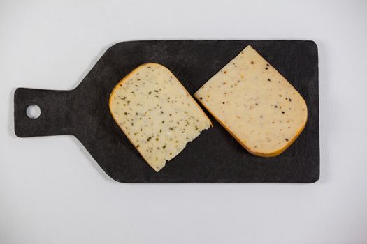 Dutch gouda cheese on chopping board