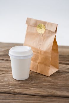 Disposable coffee cup and parcel bag