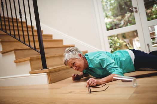 Senior woman fallen down from stairs