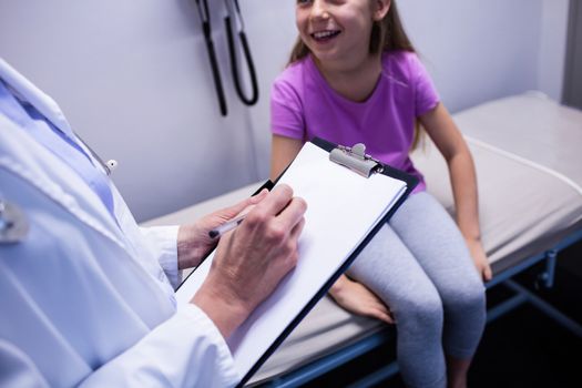 Girl consulting a doctor
