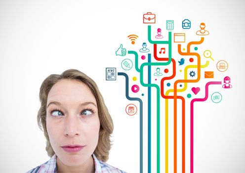 Squint eyed woman standing against application icons