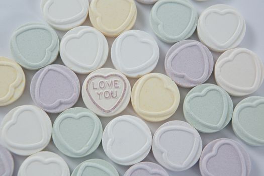 Heart shape confectionery with text I love you