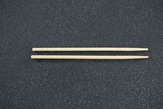 Chopsticks on a slate plate