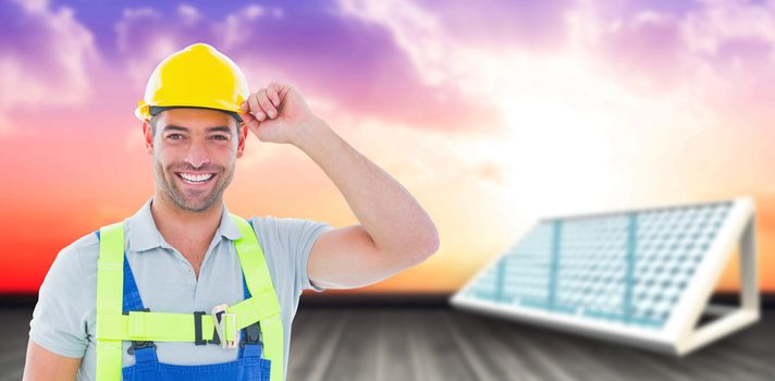 Composite image of portrait of cheerful workman holding helmet 3d