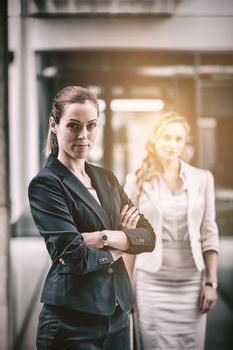 Confidence businesswoman standing in office