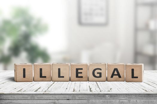 Illegal message on a wooden desk