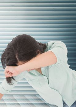 Grief distressed woman against blue background