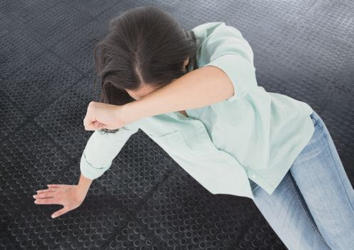Distressed woman grief on metal floor