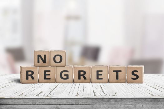 No regrets sign made with wooden blocks