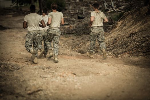 Soldiers running in boot camp