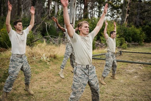 Soldiers performing stretching exercise