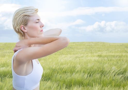 Woman meditative calm relaxing by nature field