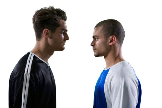 Two rival football player looking at each other