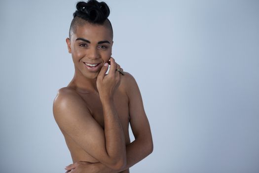 Sensuous transgender woman smiling