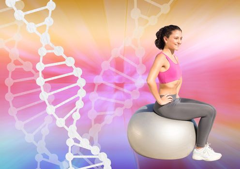 woman doing exercise with a ball and  dna chain and colors background