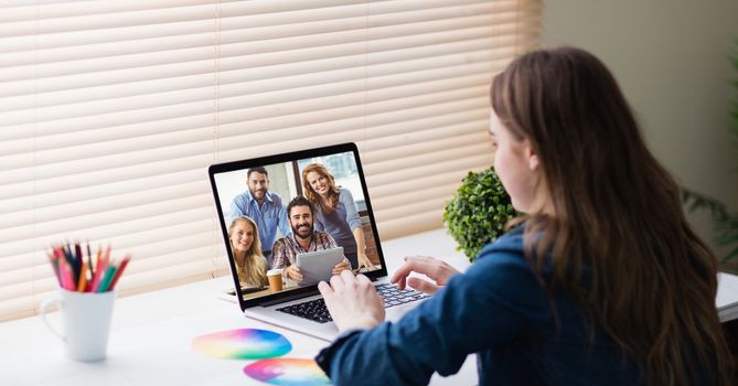 Businesswoman video conferencing in office