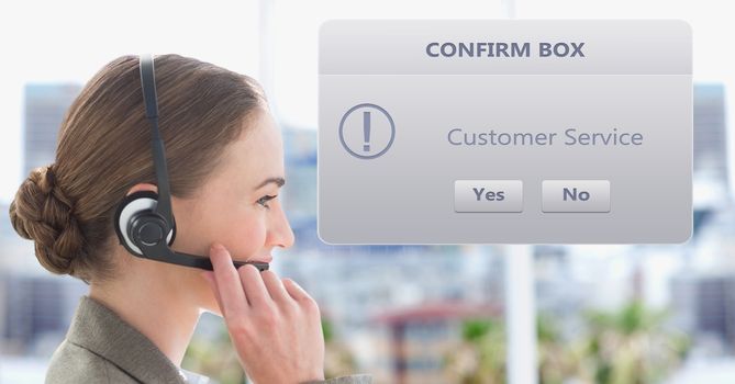 Customer service representative using headset by dialog box