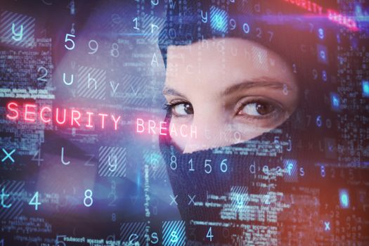 Composite image of portrait of female hacker wearing balaclava