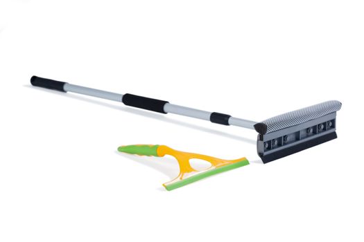 Squeegee and floor mop on white background