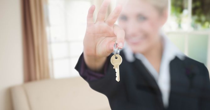 Woman Holding key  in home